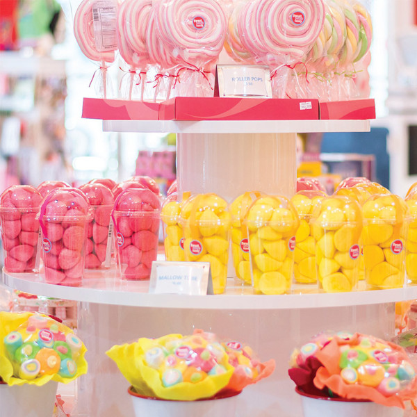 Image of a display with several different candies on display.