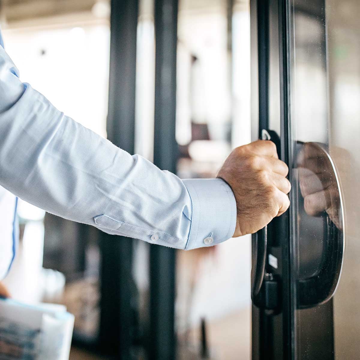 Image of someone closing a door