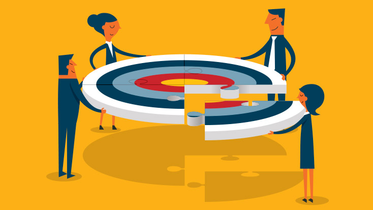 Employees putting pieces of the business together