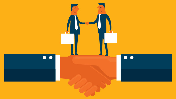 Men making first impressions by shaking hands