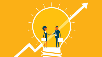 Image of two people shaking hands in a lightbulb.