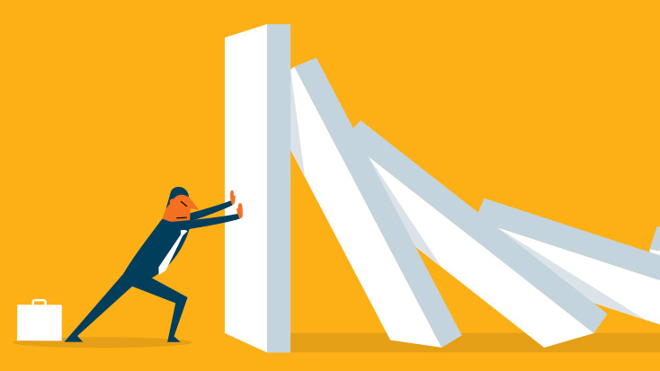 Image of falling dominos and someone trying to hold them up.