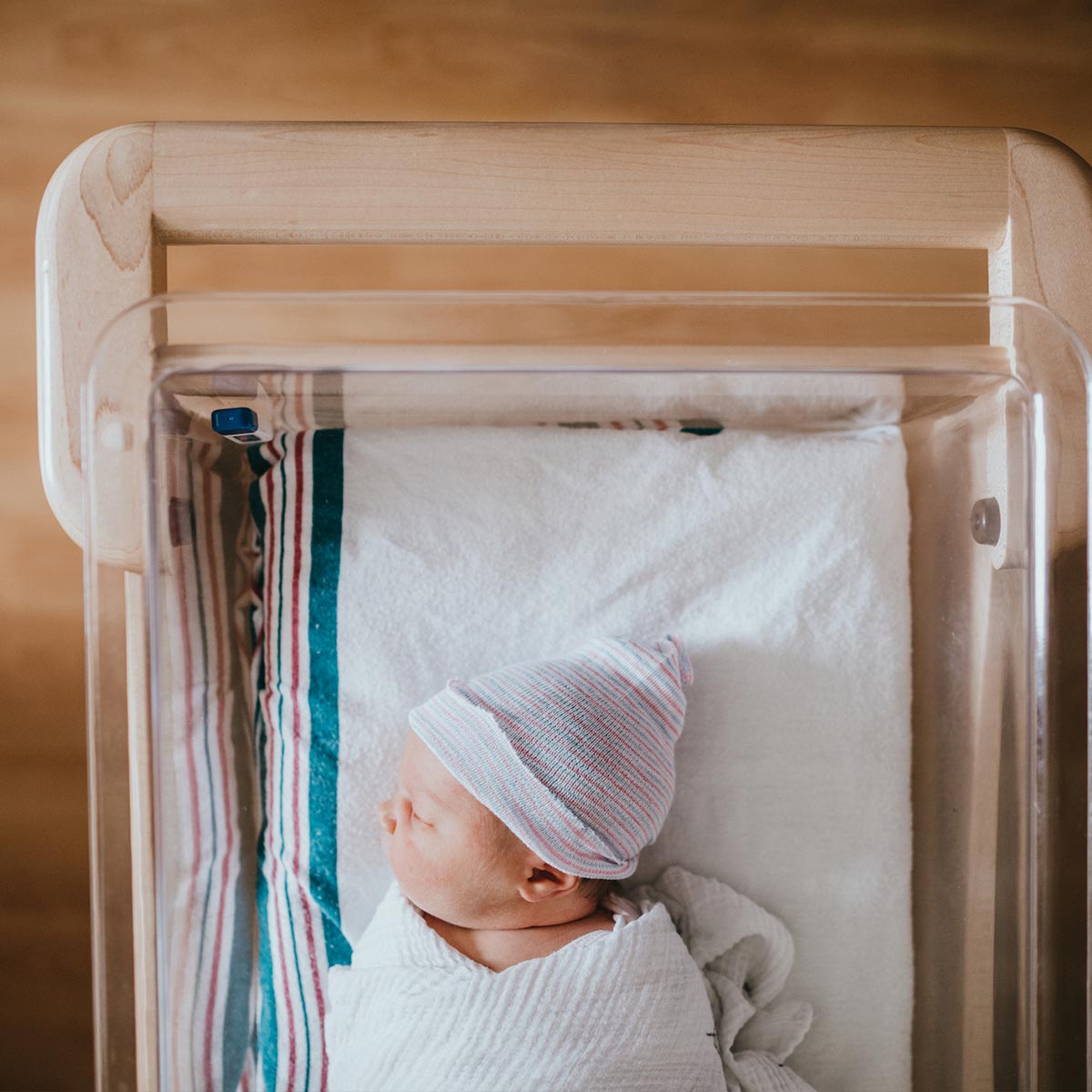 new born baby in crib