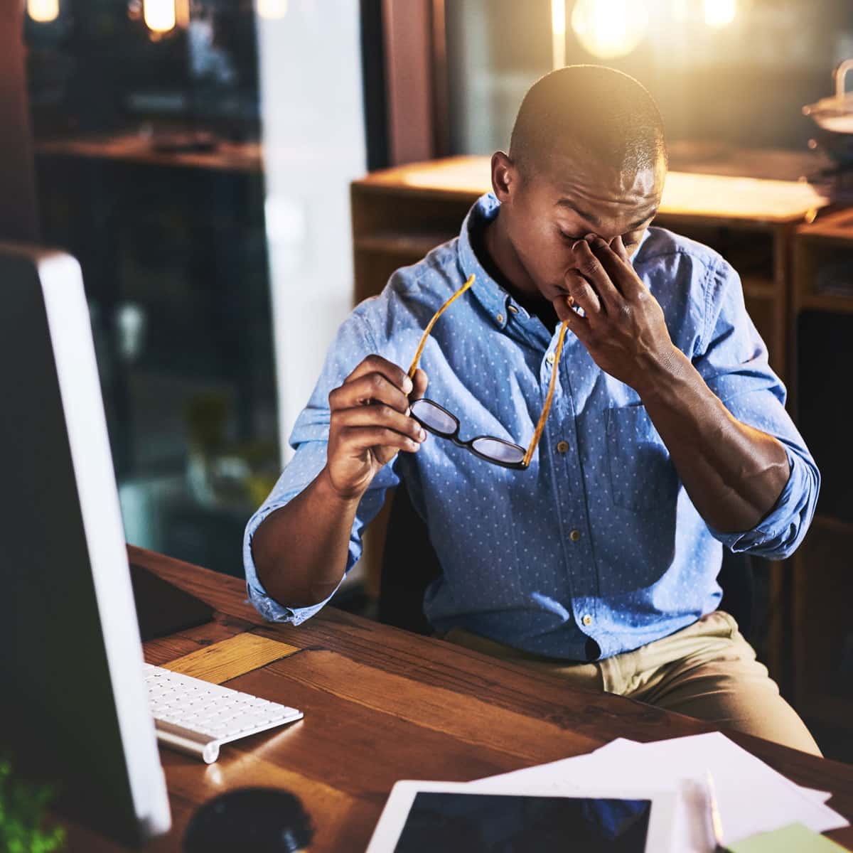 man becoming aware that it is time to pivot his life while working at his desk