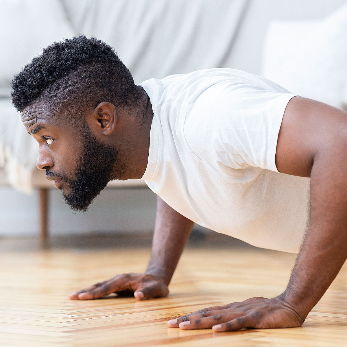 man doing push ups at home
