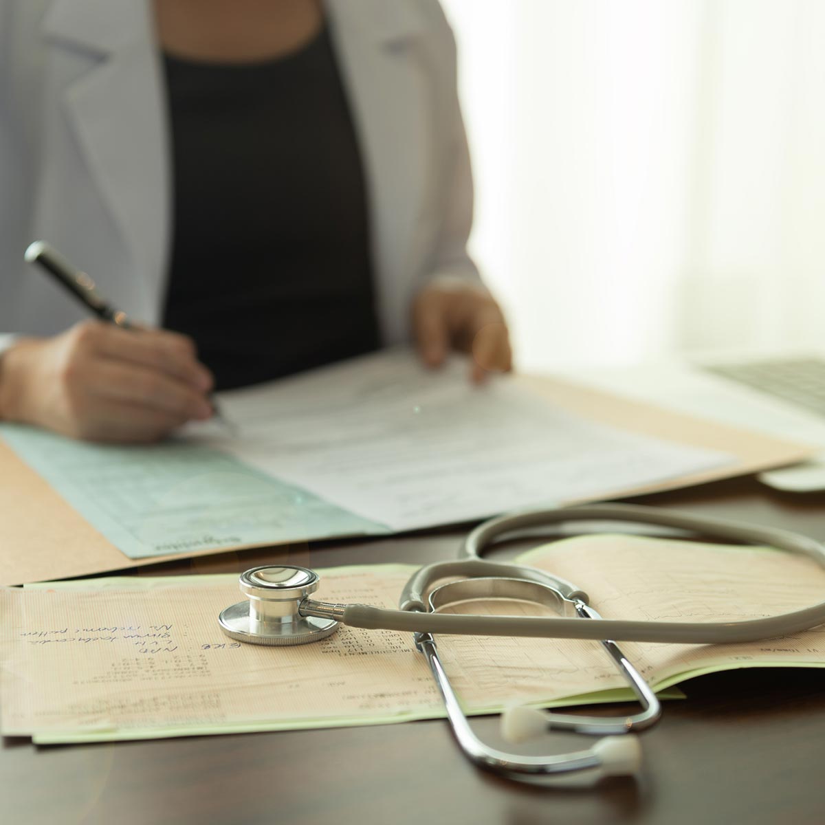 filling out paperwork in a doctors office