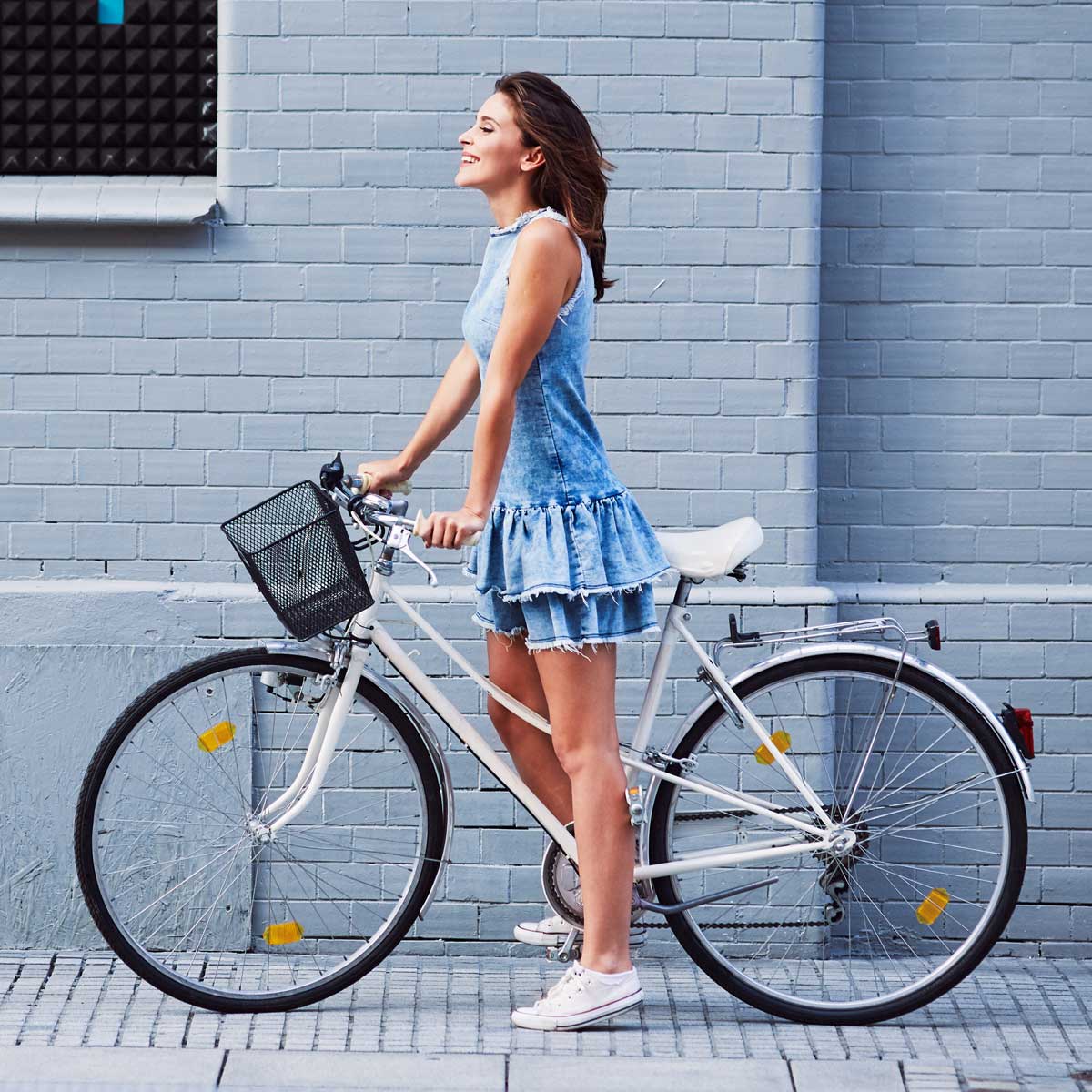 Image of a woman on a bike.