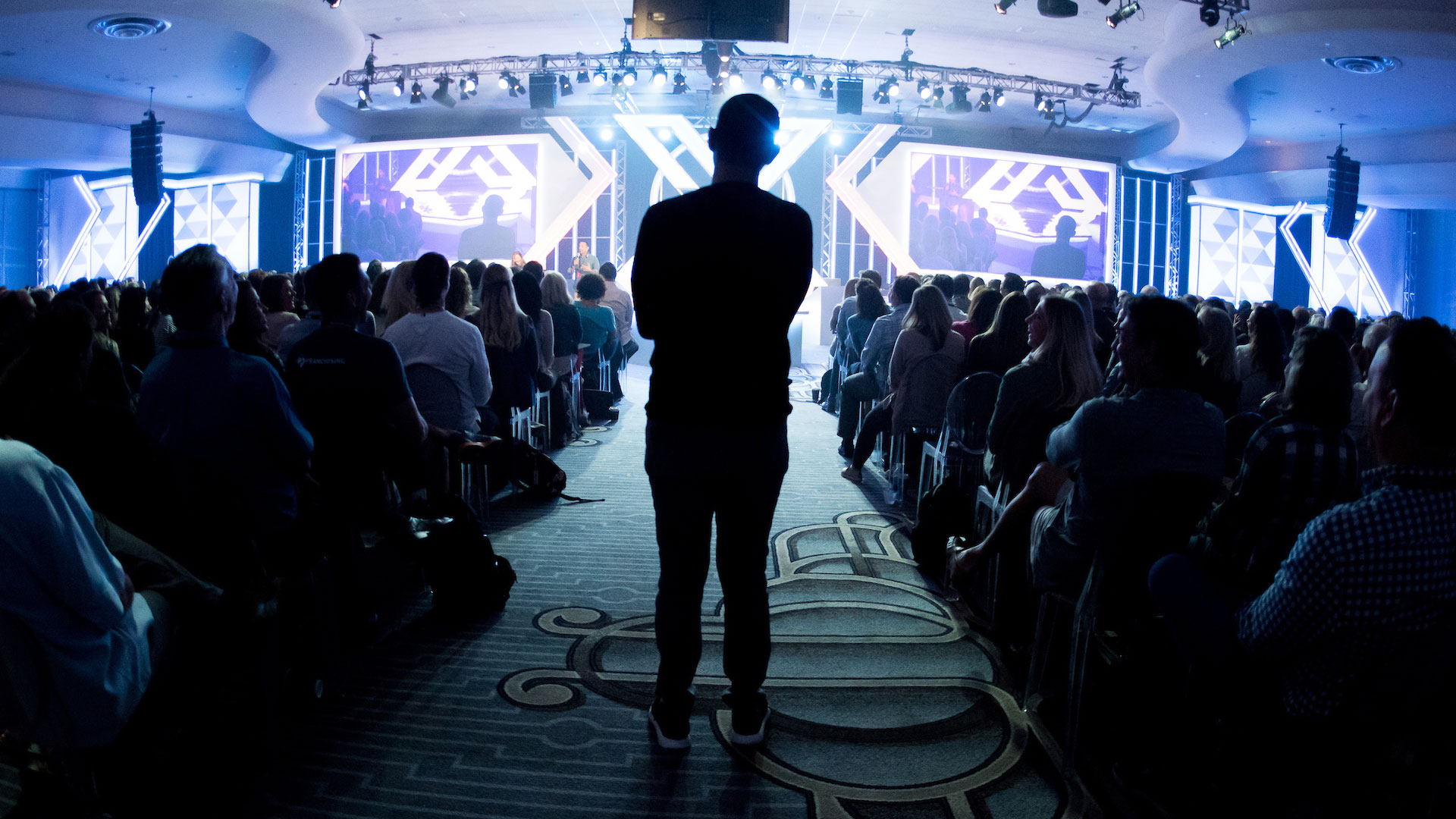 Image of Marcus Lemonis at a speaking event.