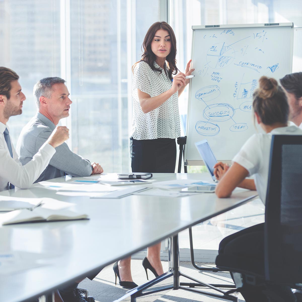 woman on a meeting with team