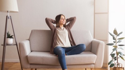 women relaxing on her couch