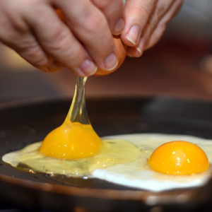 Image of egg frying on the pan