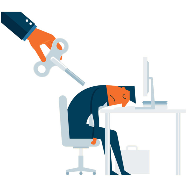 Image of a person asleep at their desk.