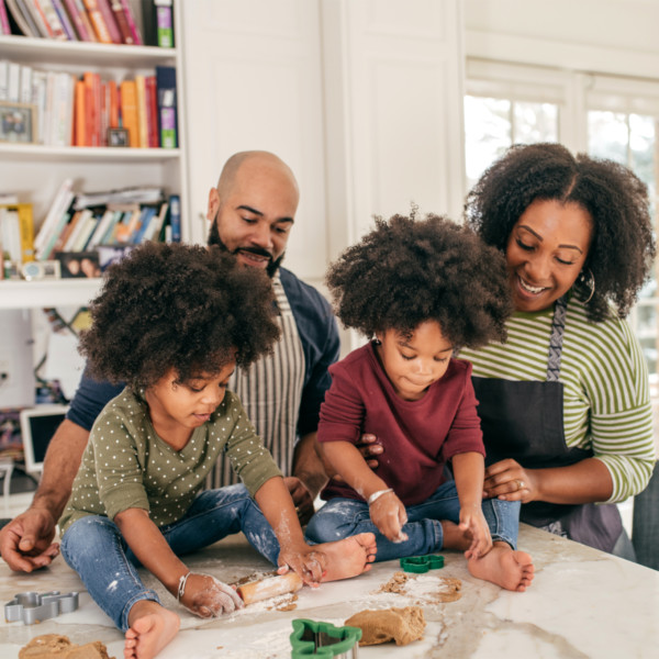 Image of family making cookies in the kitchen